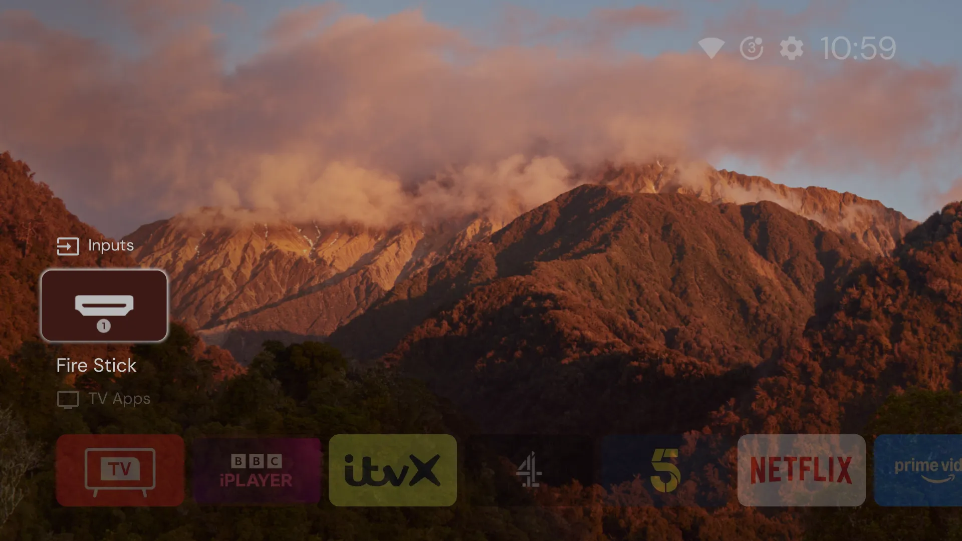The TV’s home screen after decluttering, in Projectivy Launcher: one Fire Stick input, then a row of apps starting with TV, BBC iPlayer, ITVX, Channel 4, 5 and Netflix, with nothing recommended.